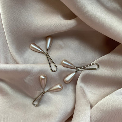 "Stijlvolle en functionele hijab spelden in rose. Een must-have accessoire voor een perfecte hijab."